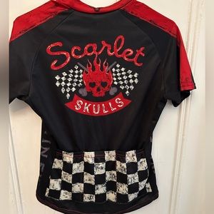 Women’s lot: 2 Twin Six cycling jerseys, size Med plus 1 Velocio size L